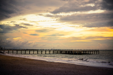 Fototapeta premium Evening time at the beach near the pier at Pala beach, Thailand