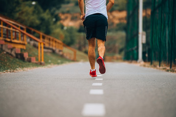 Portrait of a young man at running exercise