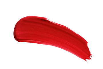 Lipstick smear smudge swatch isolated on white background. Cream makeup texture. Bright red color cosmetic product brushstroke swipe sample