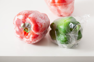 single use plastic packaging issue. peppers vegetables in plastic bag