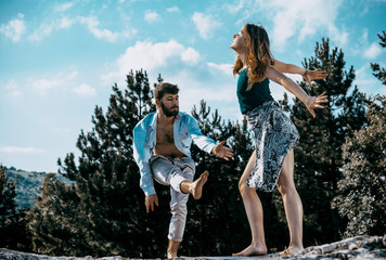 Active happy adults dancing together in dance class in nature