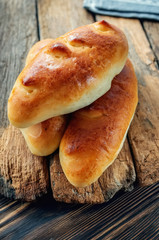 Freshly baked fragrant homemade small meat pies with an appetizing crust. Russian national cuisine