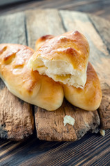 Freshly baked fragrant homemade small meat pies with an appetizing crust. Russian national cuisine