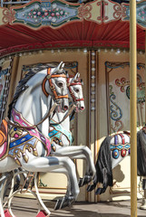 Fototapeta na wymiar Сhildren's carousel with horses
