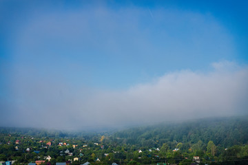 the dispersing mist lifted on the morning in August