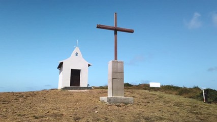 Sao Pedro dos Pescadores, Saint Pedro of Fishermen Chapel at Fernando de Noronha Island, Pernambuco, Brazil - July, 2019 - Beautiful 4k footage in a blue sky day
