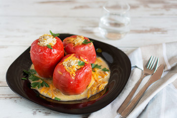 Stuffed red bell pepper with rice and meat.