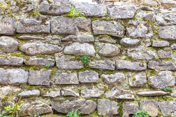 Old wall of stone boulders