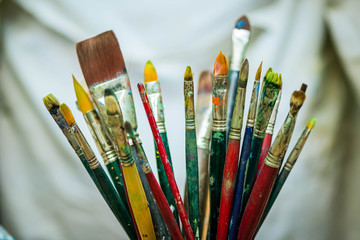 Obraz premium Painter's different brushes style for acrylic and oil paint multicolor