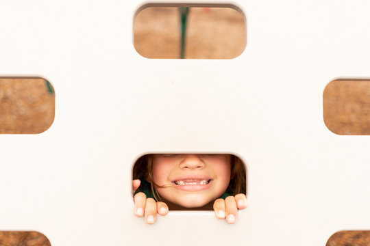 Girl Smiling with Missing Teeth