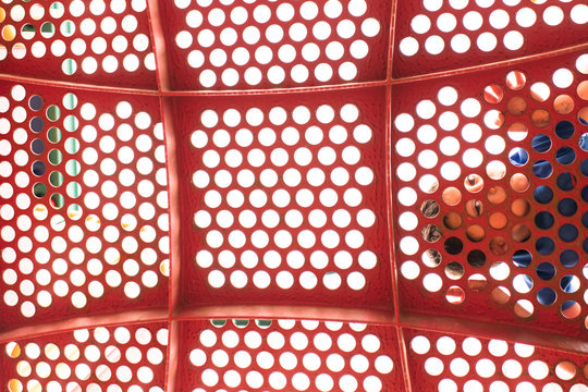 Boy Looking Down Through Playground Structure