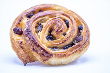 Raisin Danish pastry isolate on white background.