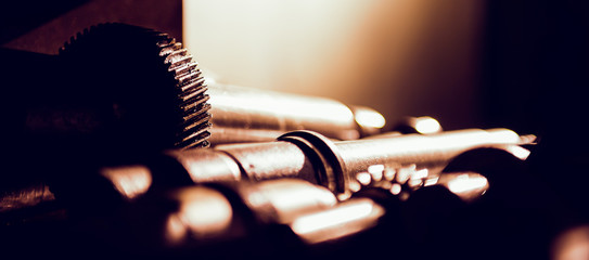 Shaft and gear after manufacturing in industrial hall