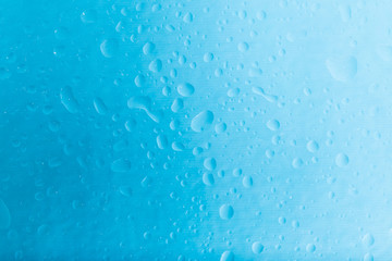 Texture of water droplets in blue. Makro, close-up.