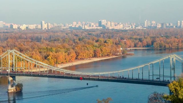 Aerial view of pedestrian suspended bridge across the rive Dnipro in Kiev, Ukraine
