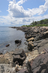 Fototapeta na wymiar The rugged coast near Kennebunkport, Maine, at early afternoon