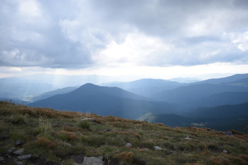 View while climbing Mount Hoverla. View of the mountain, forests and clouds. Ukrainian Carpathians.
