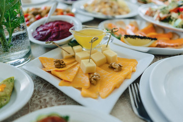 festive salty buffet, fish, meat, chips, cheese balls and other specialties for celebrating weddings and other events