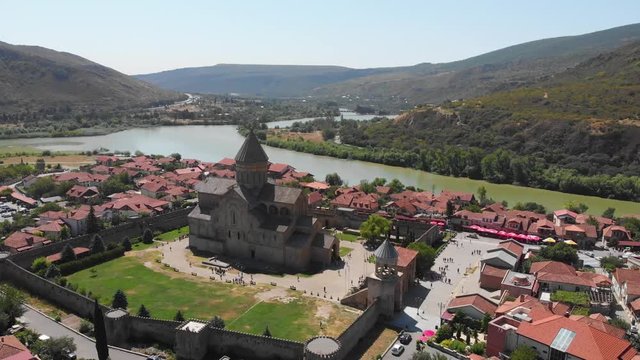 Mtskheta, Georgia. Aerial view of Svetitskhoveli Orthodox Cathedral (UNESCO World Heritage site) in the main square of Mtskheta