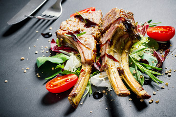 Grilled rack of lamb on slate plate