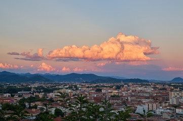 Bergamo with Alps mountains and blue cloudy sky