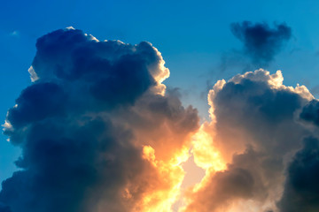 Beautiful clouds on sunset sky in summer time.