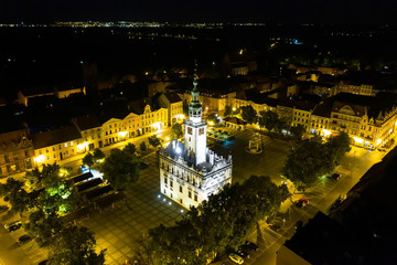 Night view of a Town Hall in the middle of a town square in Europe