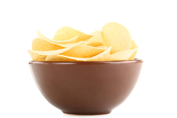 Potato chips in bowl isolated on white background