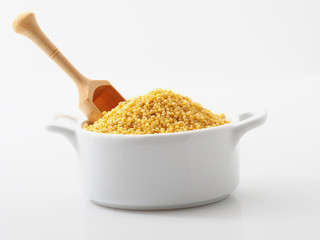 Dried raw millet on the white background