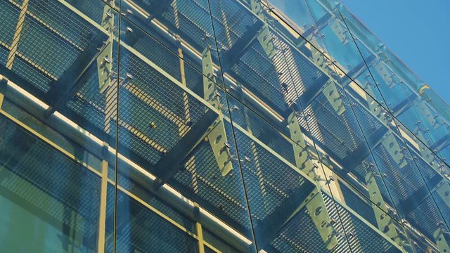 Glass Curtain Facade Wall. Fasteners Elements of Spider Glass System. Facade Detail. Architecture Abstract Background. Tilt Down