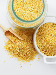 Dried raw millet on the white background