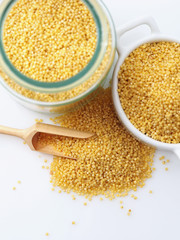 Dried raw millet on the white background
