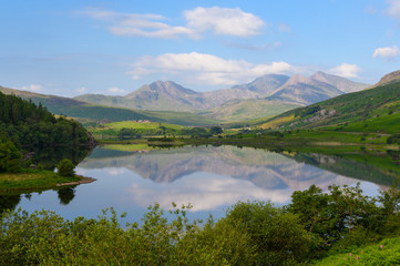 Naklejka na ściany i meble View to a mountain lake in Snowdonia National Park in North Wales of the United Kingdom