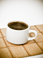 Tasty cup of coffe with bean coffe