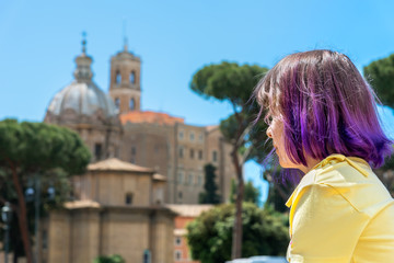 Girl is looking to the town. Rome, Italy