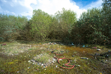 Site of former gas works, now derelict and overgrown after many years of disuse.