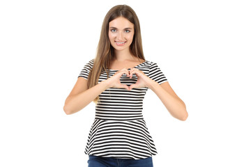 Young woman showing heart by hands isolated on white background
