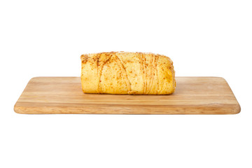 Cheese on a wooden board. Cheese with spices close-up on a white background.