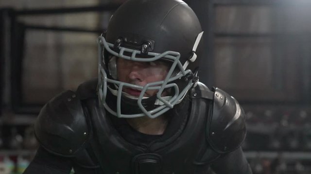 A young man trains and plays American football, throws and catches the ball