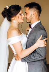 Sweet bride and groom meeting in the room