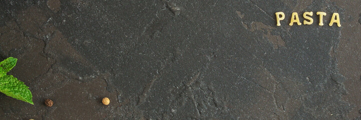 Pasta Alphabet and ingredient for sauce (set of ingredients, raw pasta) serving second course. top food background. copy space