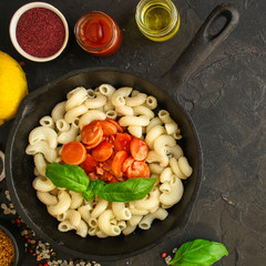 pasta tomato sauce and sausages (Cavatappi, Elbow, Campanelle) serving second course. top food background. copy space