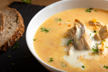 Ciorba radauteana - Romanian traditional chicken soup with cream and garlic