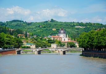 Fototapeta na wymiar View of the Garibaldi Bridge (Ponte Garibaldi) and the San Giorgio in Braida (San Giorgio in Braida), Verona, Italy.