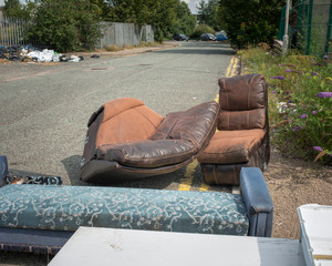 Fly tipping in urban street, West Midlands, UK