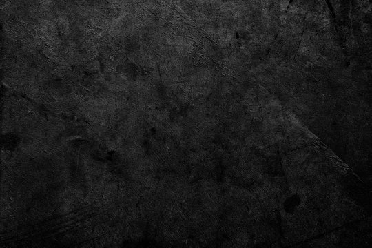 Black dark black grunge textured concrete stone wall background