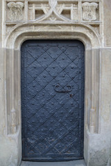 Old black strong iron door