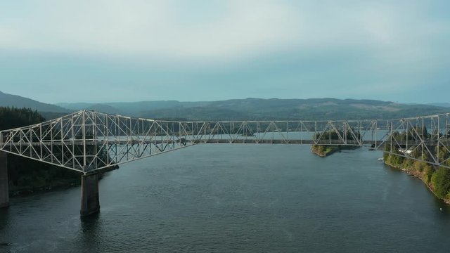 The Bridge of the Gods is a steel truss cantilever bridge that spans the Columbia River between Cascade Locks, Oregon, and Washington state near North Bonneville. 