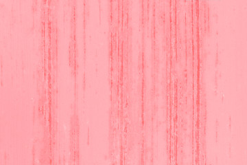 Vertical scratches on a flat metal surface. Traces of rust. The texture is pink in color.