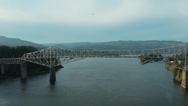 The Bridge of the Gods is a steel truss cantilever bridge that spans the Columbia River between Cascade Locks, Oregon, and Washington state near North Bonneville. 